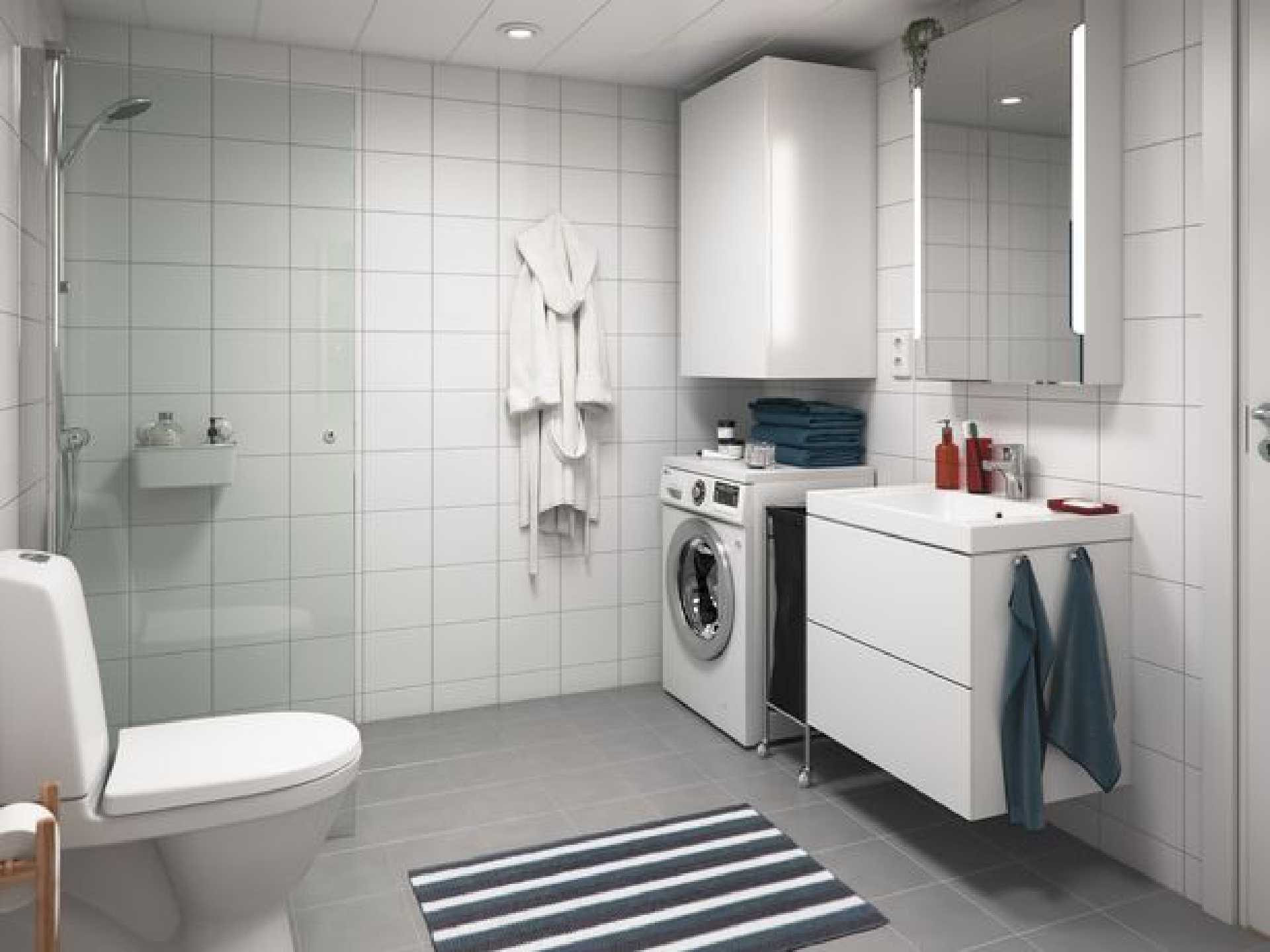 Inside of BoKlok house, showing a stylish but functional bathroom/utility space